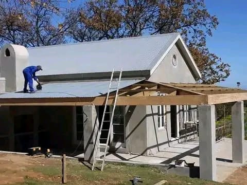 New roof sheeting and timber patio structure going up